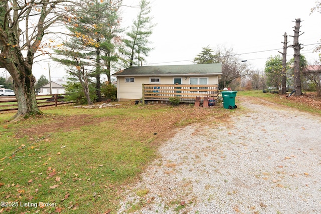 single story home featuring a deck