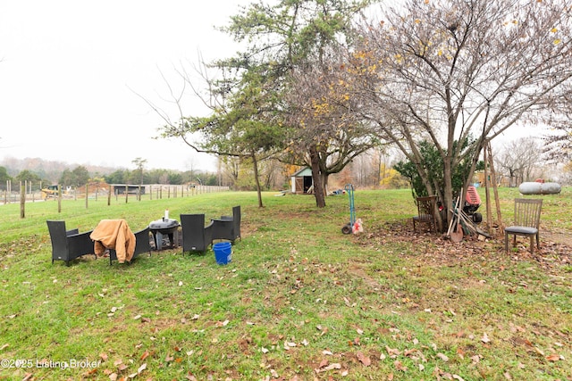 view of yard featuring a storage shed