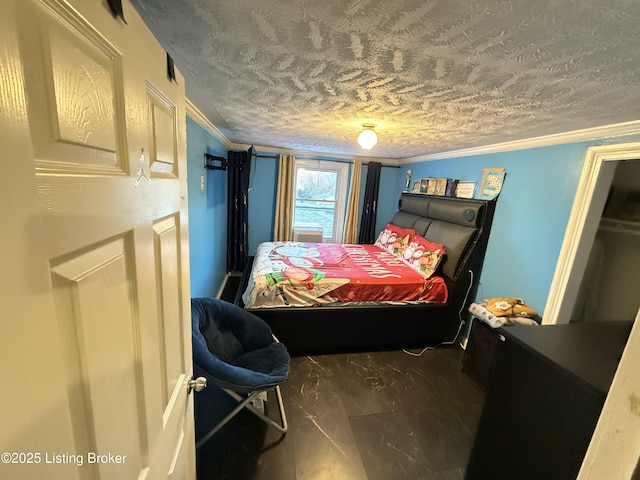 bedroom with a textured ceiling and crown molding