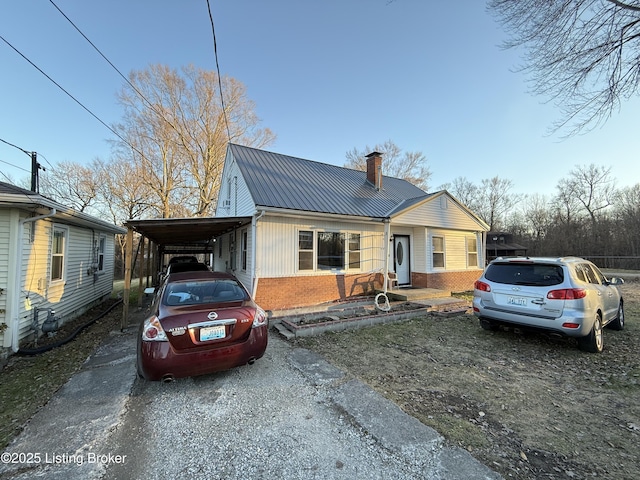 view of front of home featuring a carport