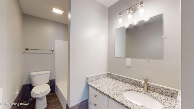 full bathroom featuring independent shower and bath, toilet, tile patterned flooring, and vanity