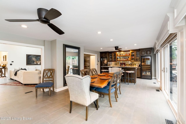 dining area with ceiling fan, visible vents, and recessed lighting