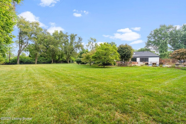 view of yard with fence