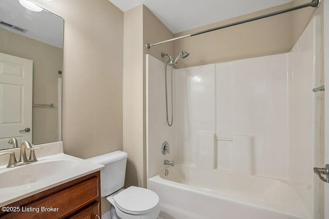 full bathroom with vanity, toilet, and shower / bath combination