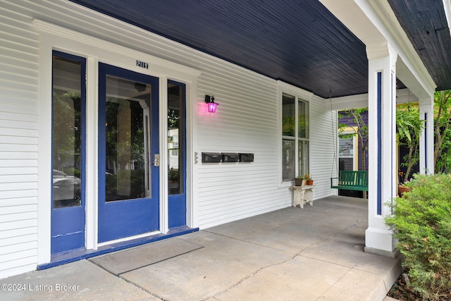 view of patio featuring a porch