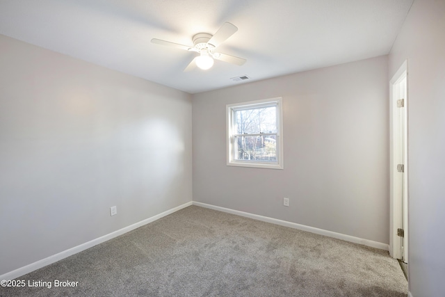 empty room with light carpet and ceiling fan