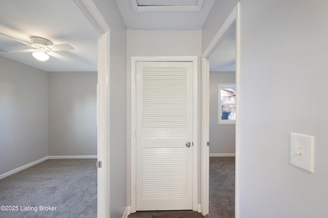 corridor with carpet flooring