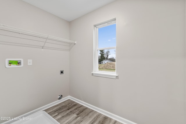 laundry room with electric dryer hookup, wood-type flooring, and hookup for a washing machine