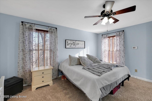 bedroom featuring ceiling fan and carpet floors