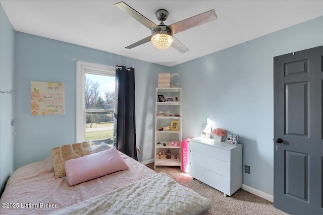 carpeted bedroom featuring ceiling fan