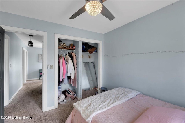 carpeted bedroom with a closet and ceiling fan