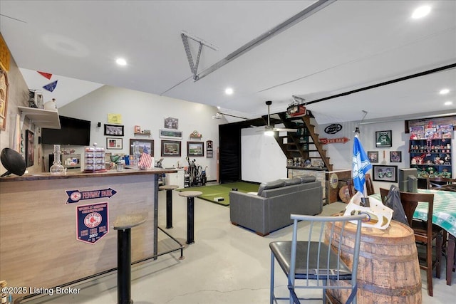 interior space featuring ceiling fan