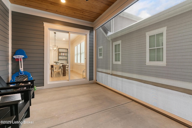 property entrance with a patio area