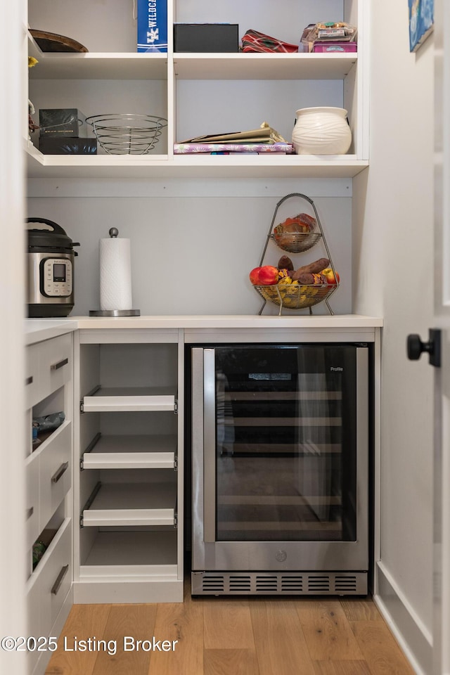 pantry featuring wine cooler