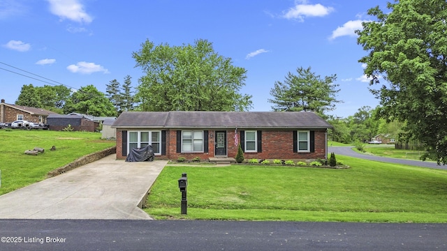102 Eastland Dr, Bardstown, KY 40004 - ranch-style home with brick siding, concrete driveway, and a front yard