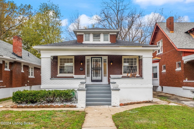 bungalow-style home with a porch