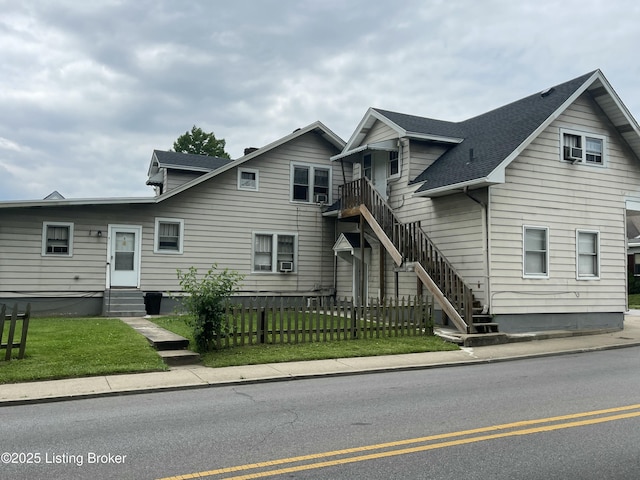 view of front of home with a front yard