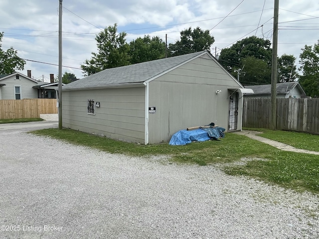 view of outdoor structure featuring a yard