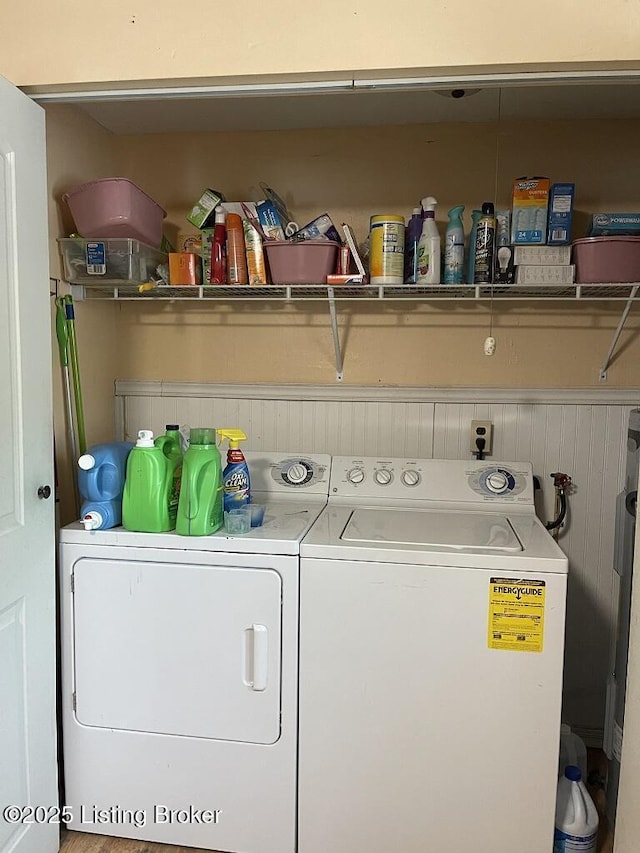 clothes washing area with independent washer and dryer