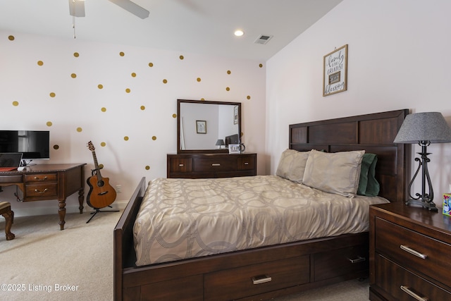 bedroom with ceiling fan and light colored carpet