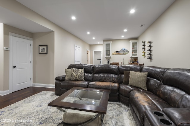 living room with sink and dark hardwood / wood-style flooring