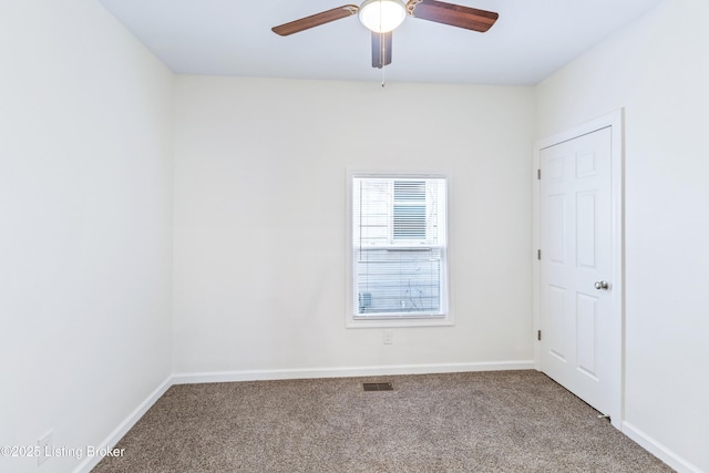 unfurnished room featuring carpet and ceiling fan