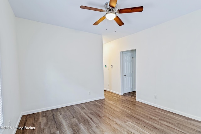 unfurnished room featuring ceiling fan and light hardwood / wood-style flooring