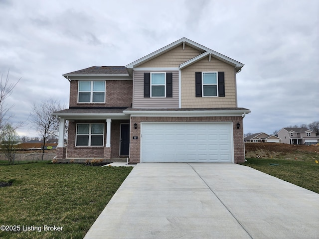 view of front of home featuring a front yard and a garage