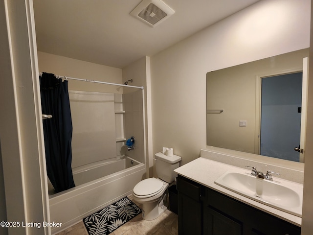 full bathroom with vanity, shower / tub combo with curtain, tile patterned floors, and toilet