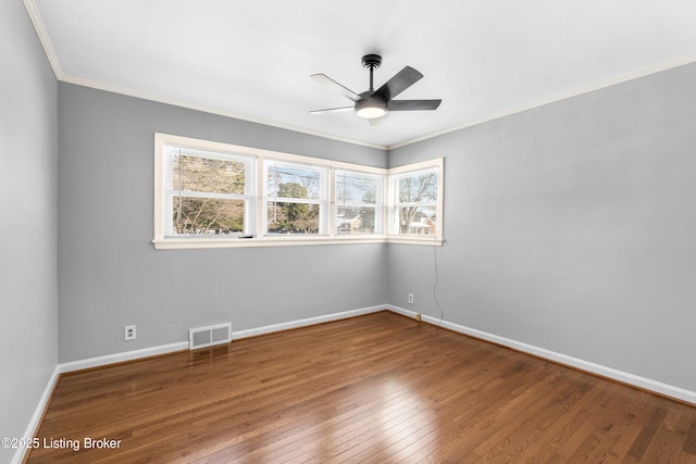 unfurnished room featuring hardwood / wood-style floors, ceiling fan, and ornamental molding