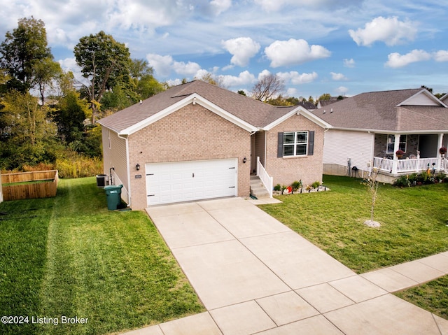 ranch-style house featuring a garage and a front lawn