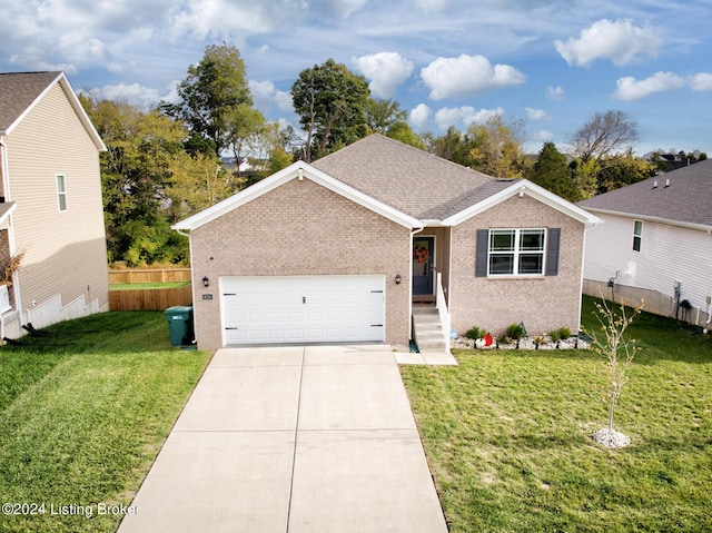 single story home with a front yard and a garage