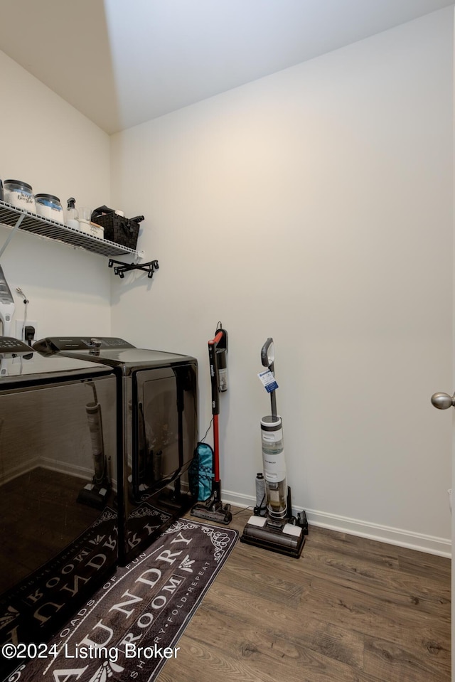 interior space with wood-type flooring and independent washer and dryer