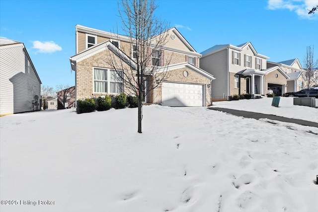 front of property with a garage