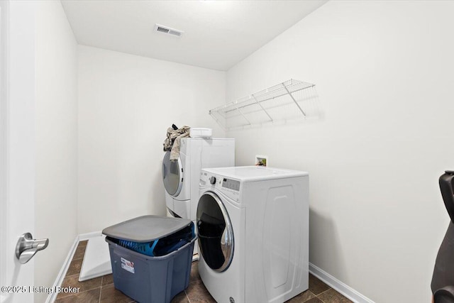 washroom featuring separate washer and dryer