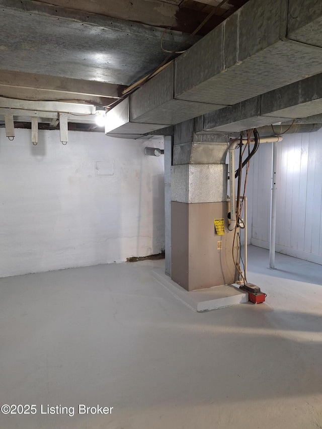 basement featuring heating unit