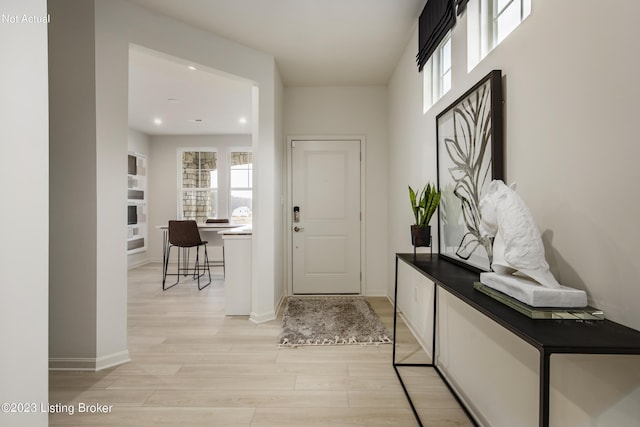 foyer with light hardwood / wood-style flooring