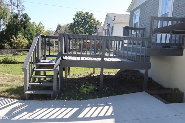 view of playground featuring a deck