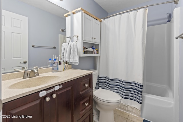 full bathroom with toilet, shower / tub combo, vanity, and tile patterned floors