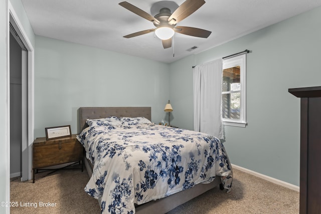 carpeted bedroom featuring ceiling fan