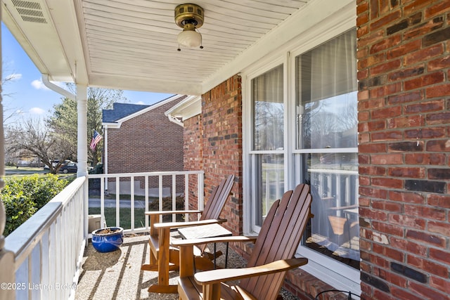 balcony featuring a porch