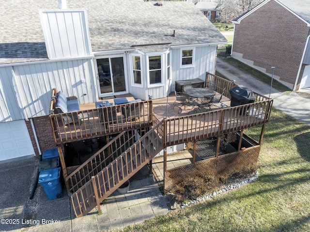 deck featuring a grill