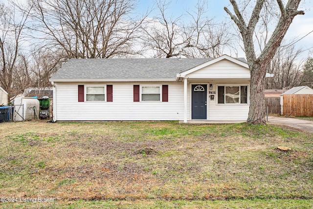 single story home featuring a front lawn