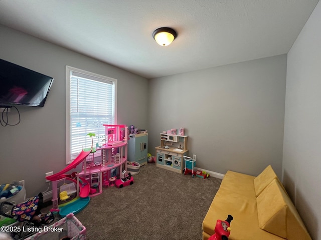 recreation room with carpet floors