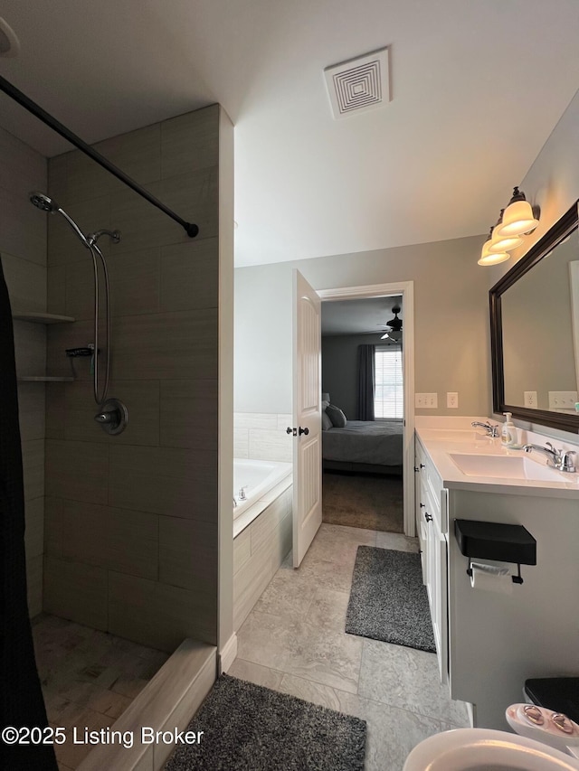 bathroom featuring vanity, ceiling fan, and plus walk in shower