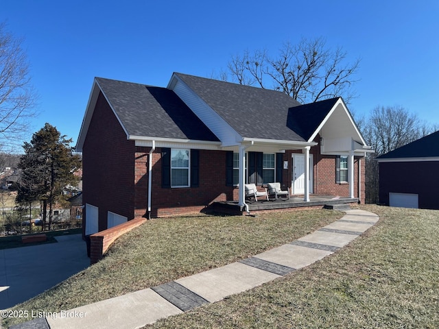 view of front facade with a garage, a front lawn, and covered porch