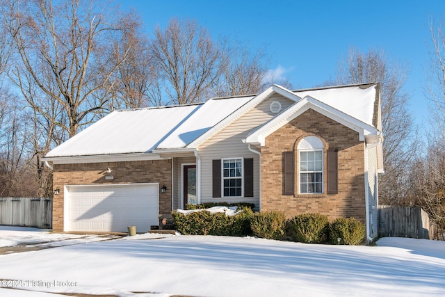 view of front of home with a garage