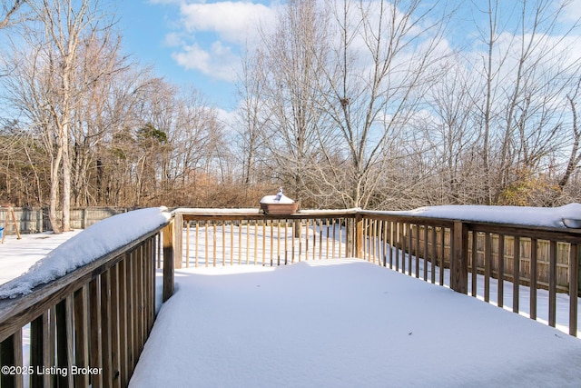 view of snow covered deck