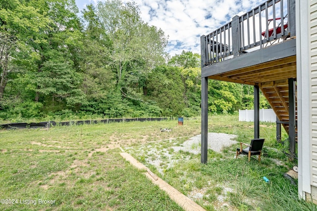 view of yard with a wooden deck