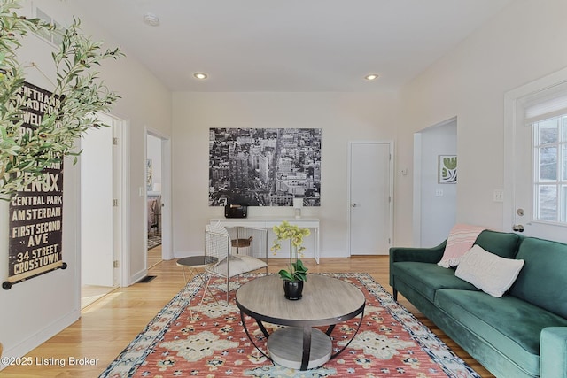 living room featuring light wood-type flooring